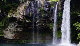Panoramic view of Phnom Kulen’s waterfalls for a scenic Phnom Kulen Tours banner by Legend Travel Group.
